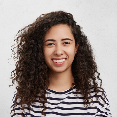 cute girl with curly hair smiling